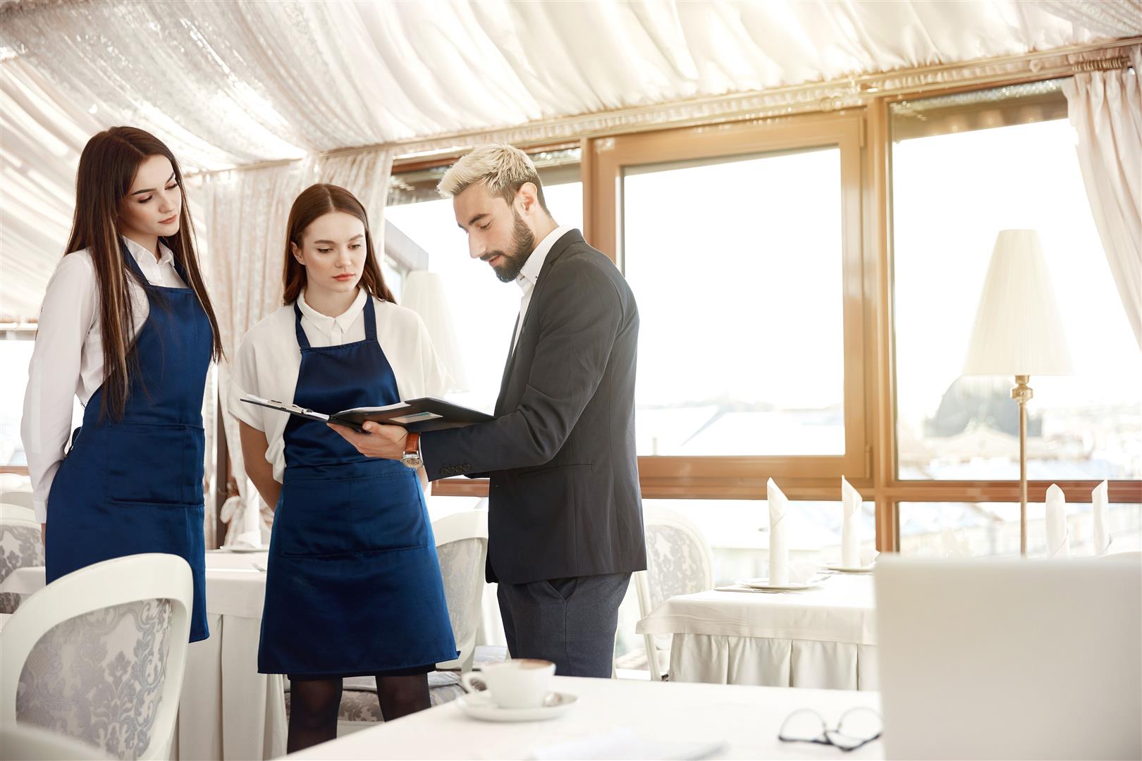 director-restaurant-is-giving-work-instructions-waitresses.jpg