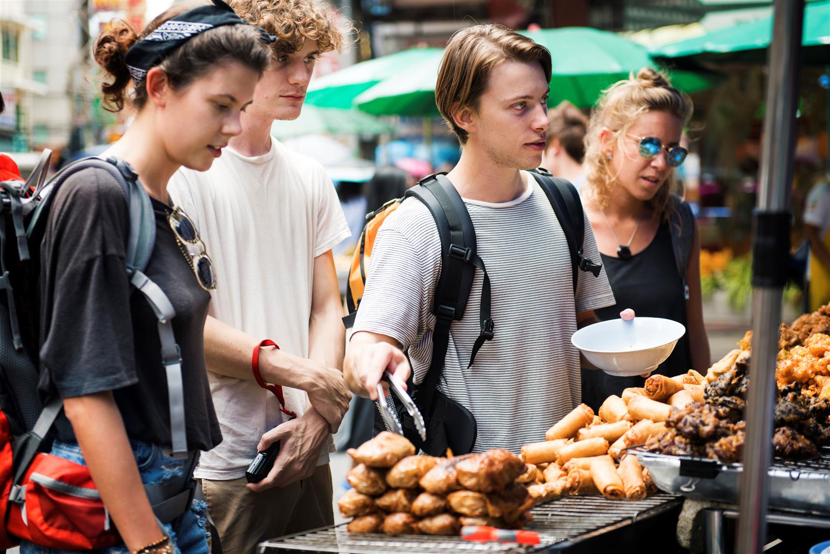 group-tourists-buying-thai-food-food-stall.jpg